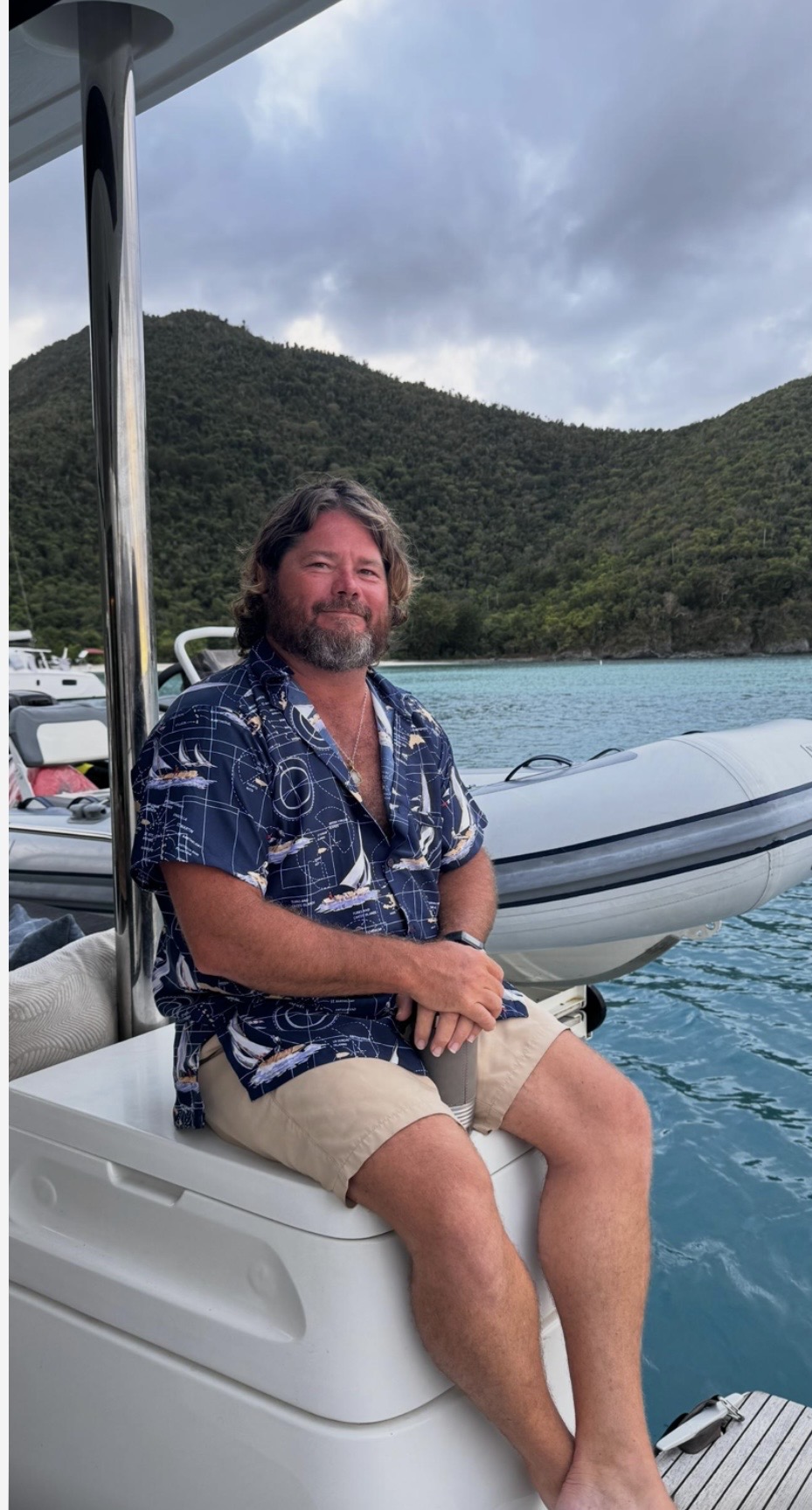 Captain Sammy relaxed on the tender boat